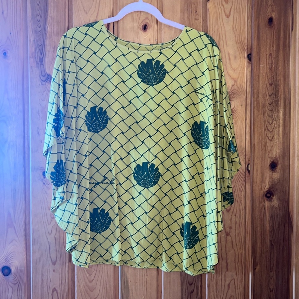 Gently used living Hula extra small top